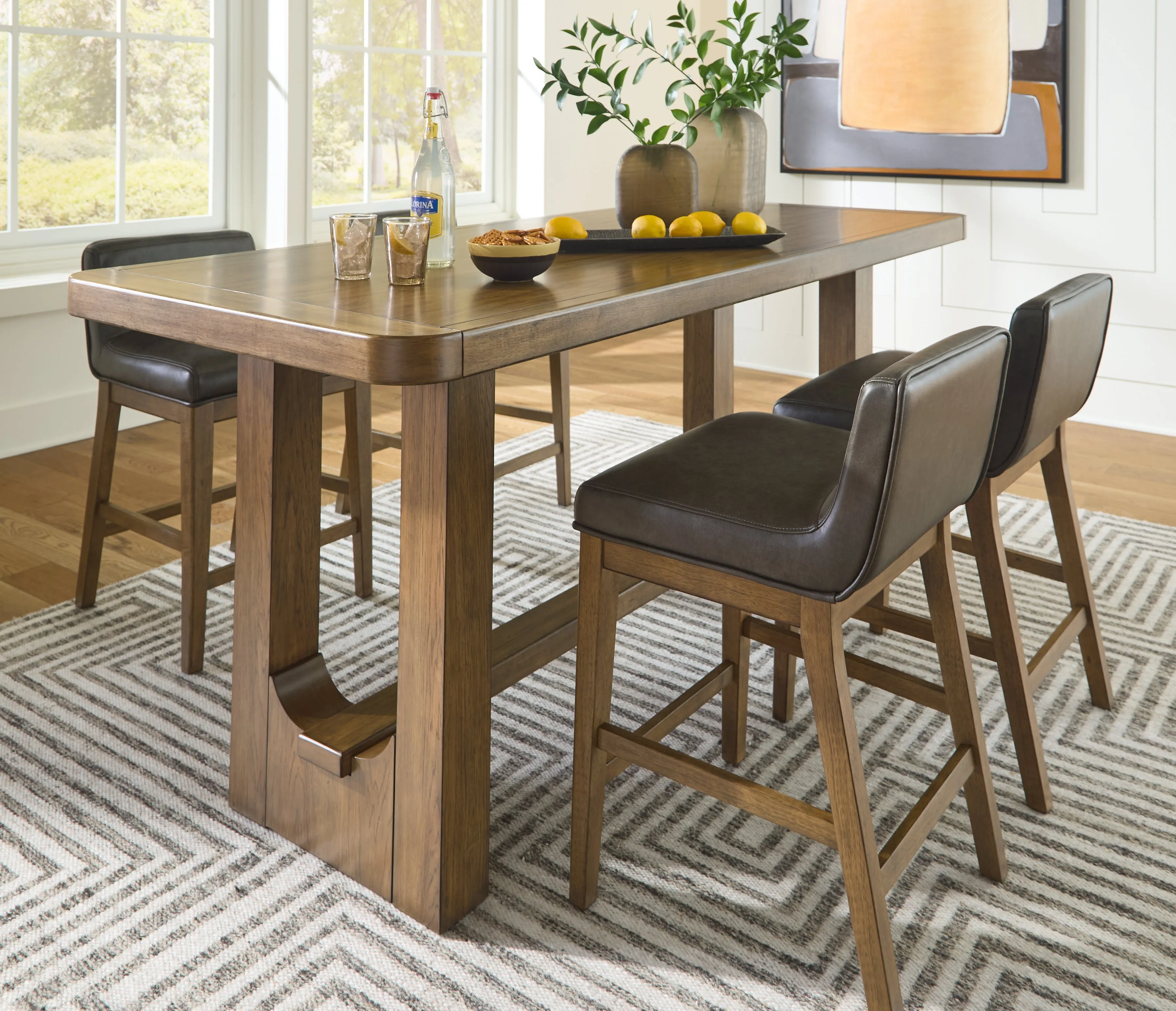Cabalynn Counter Height Dining Table and 4 Barstools in Light Brown
