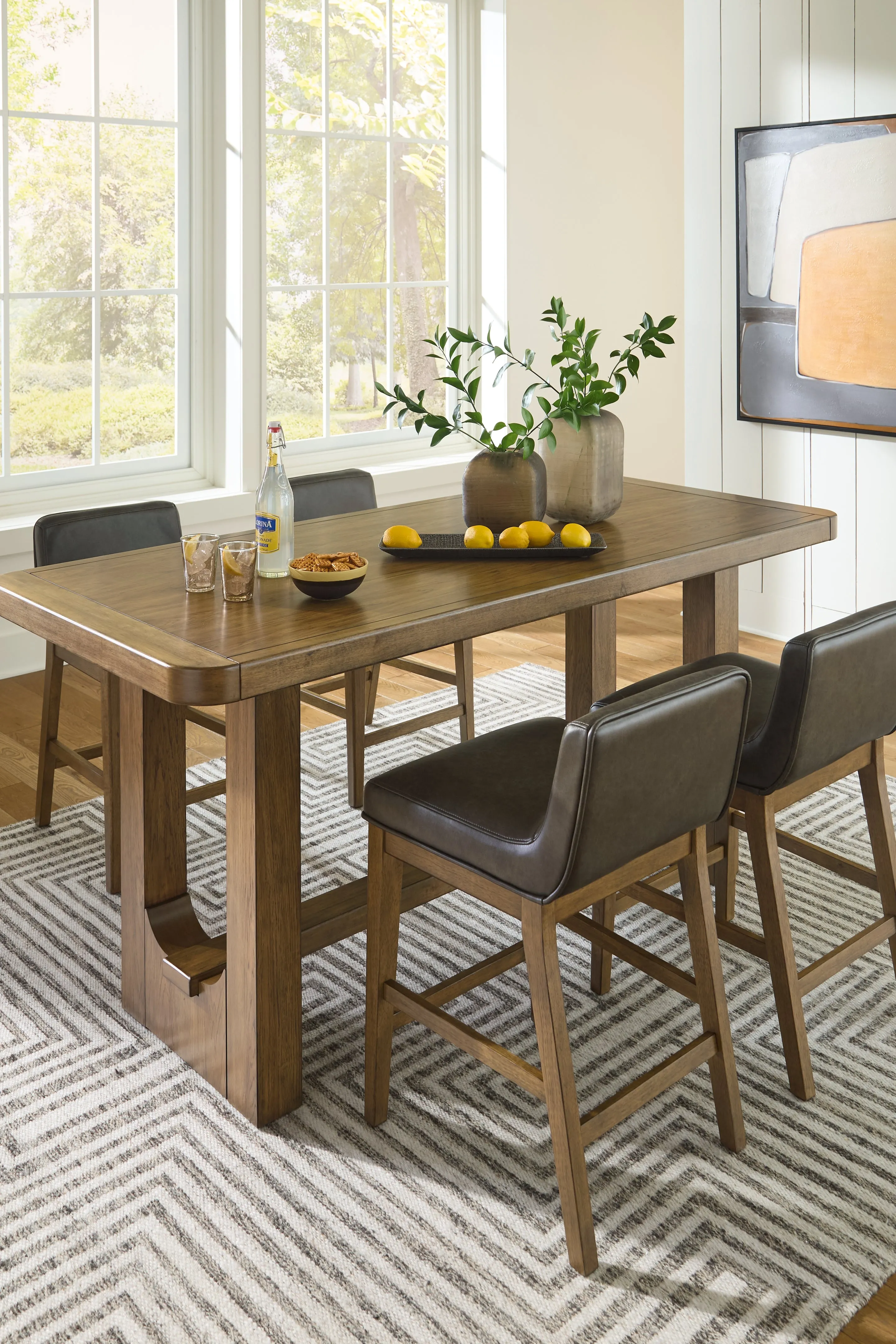 Cabalynn Counter Height Dining Table and 4 Barstools in Light Brown
