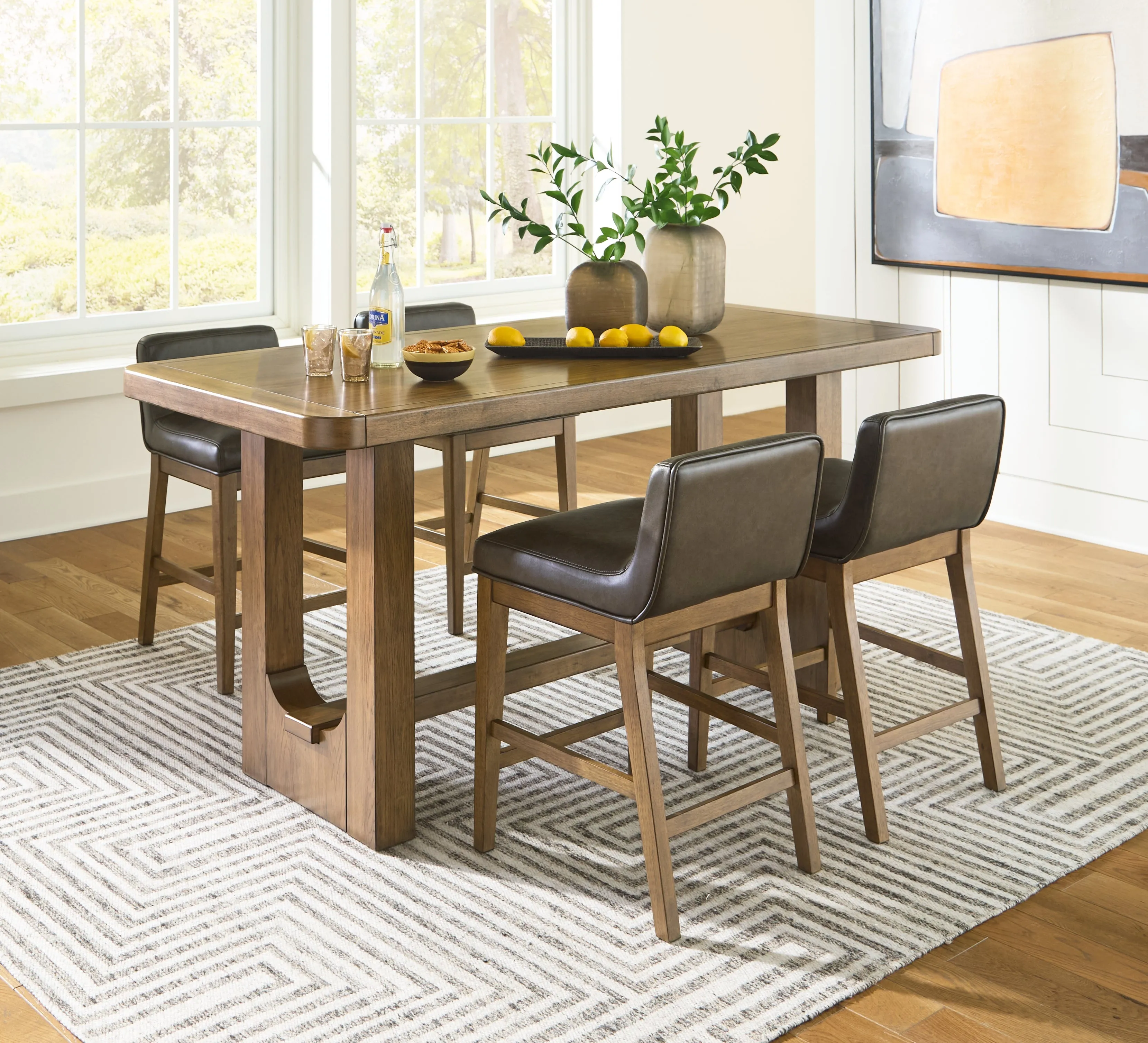 Cabalynn Counter Height Dining Table and 4 Barstools in Light Brown