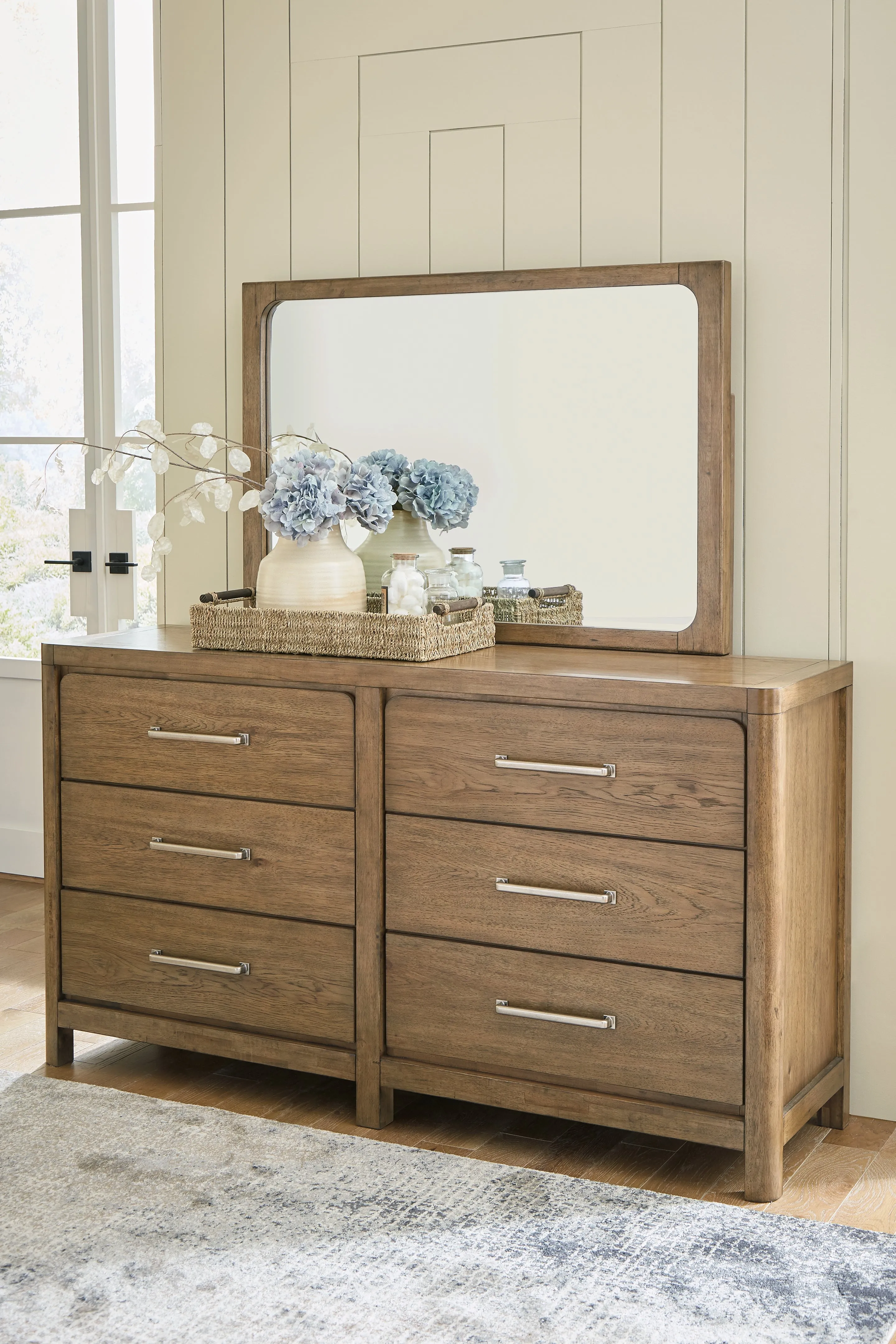 Cabalynn King Upholstered Bed with Mirrored Dresser, Chest and 2 Nightstands in Light Brown
