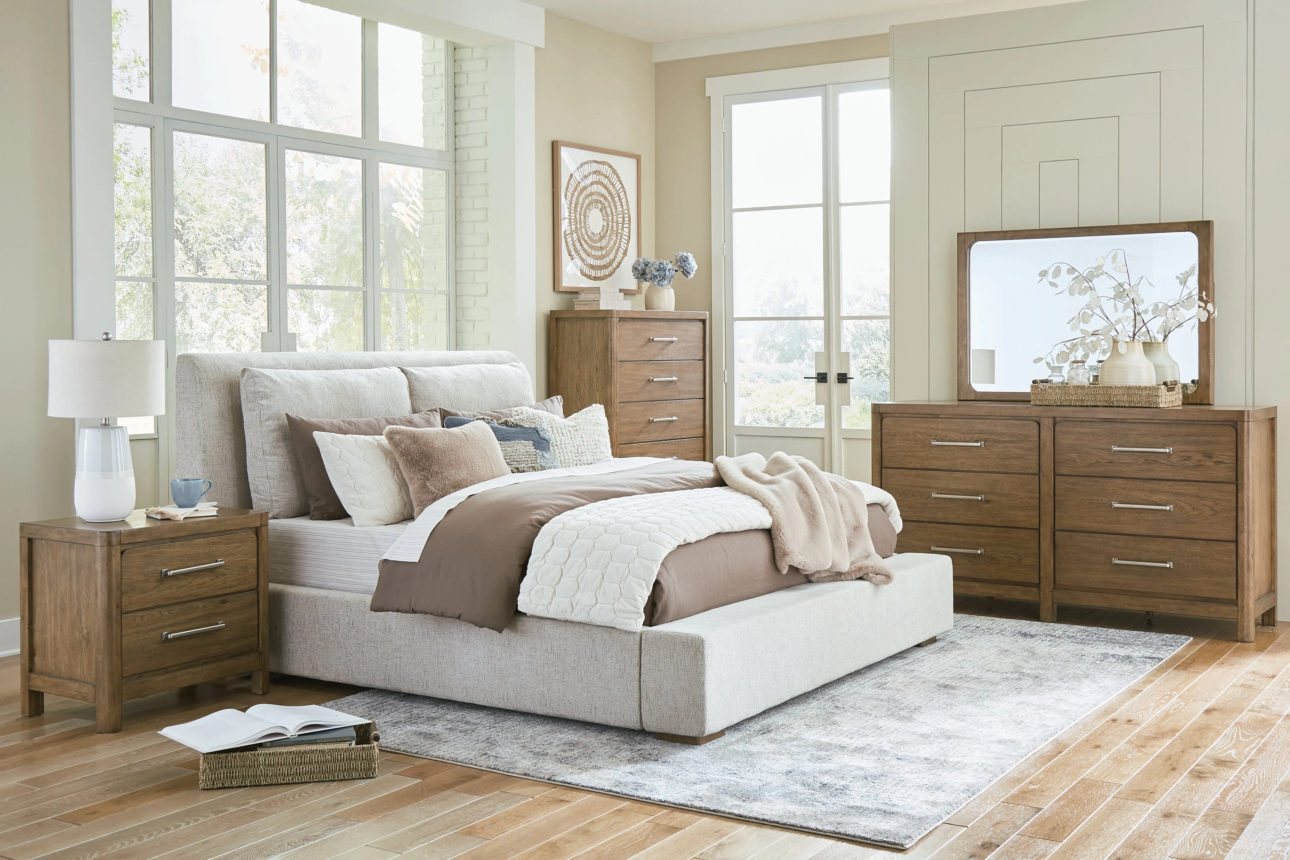 Cabalynn King Upholstered Bed with Mirrored Dresser, Chest and 2 Nightstands in Light Brown