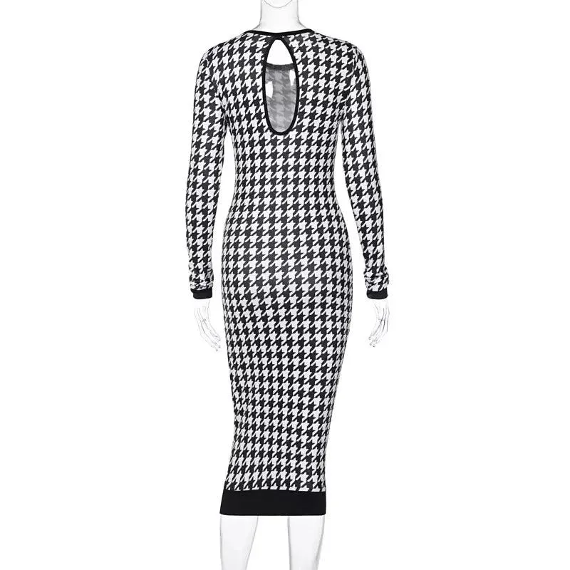 CLASSIC HOUNDSTOOTH PULLOVER DRESS - TIMELESS ELEGANCE IN EVERY THREAD