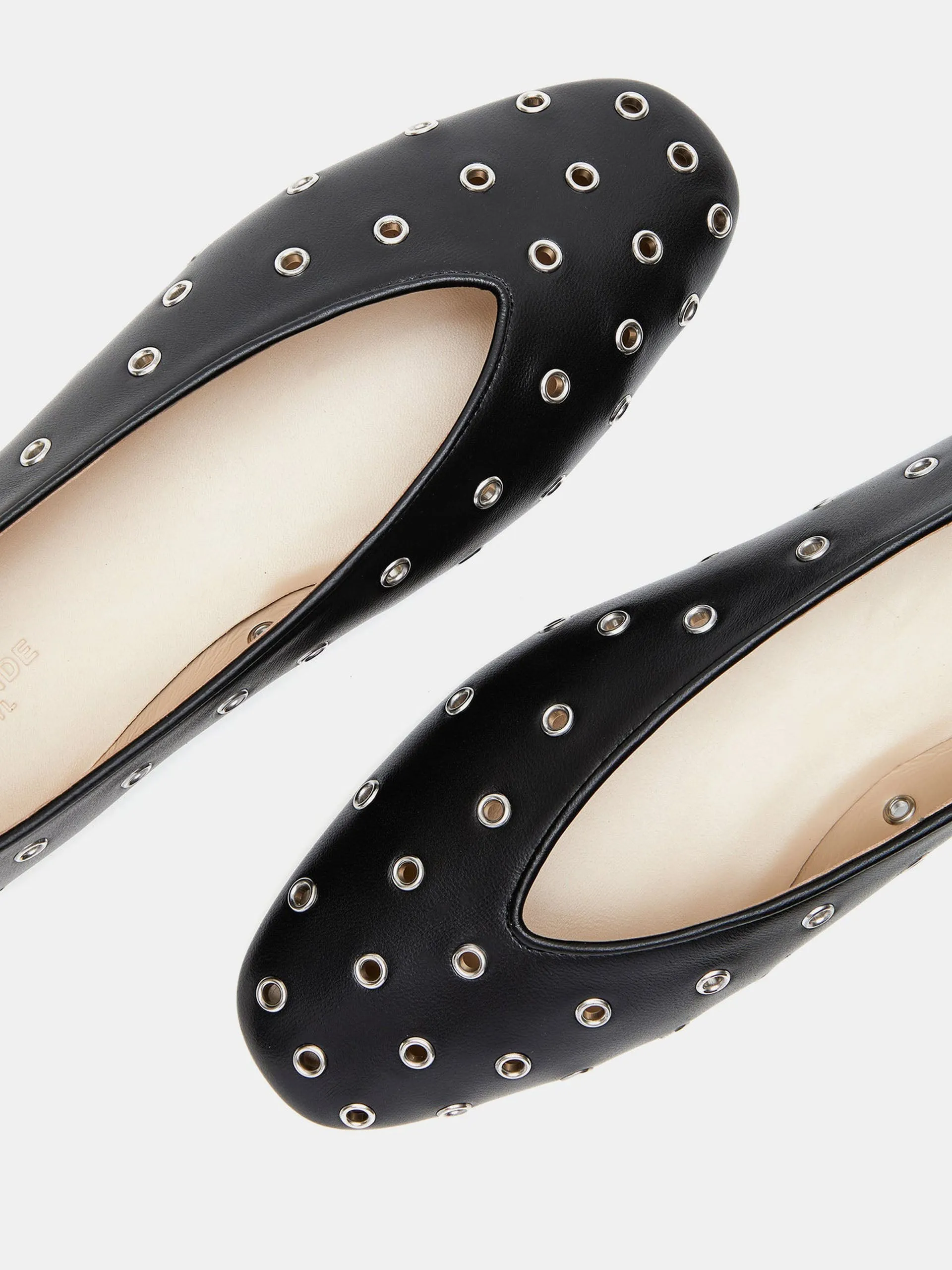 Eyelet studded black leather Regency slippers