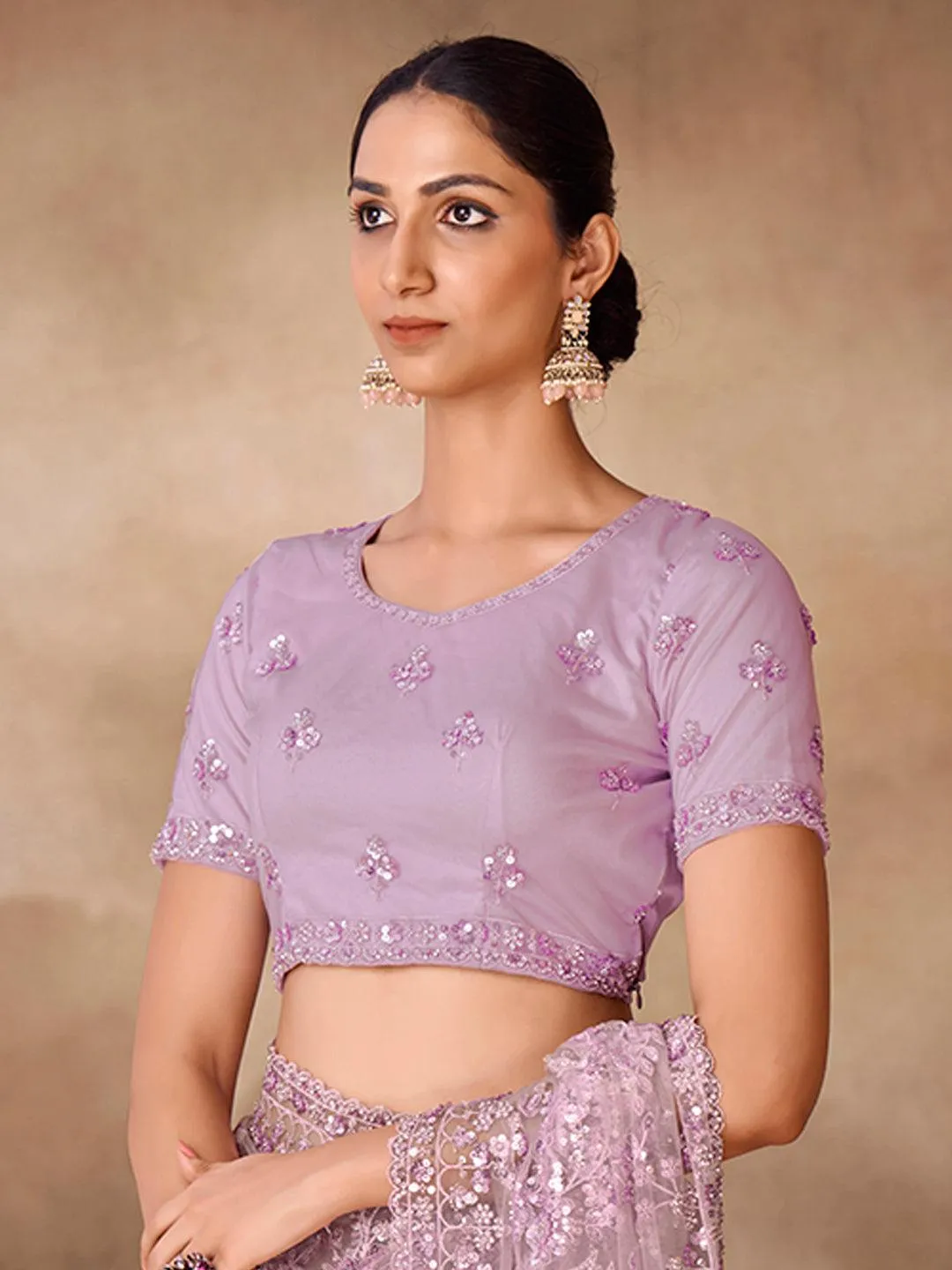 Lilac color Embroidered and zarkan work saree