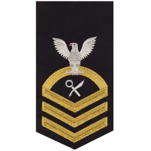 Navy E7 MALE Rating Badge: Intelligence Specialist - seaworthy gold on blue